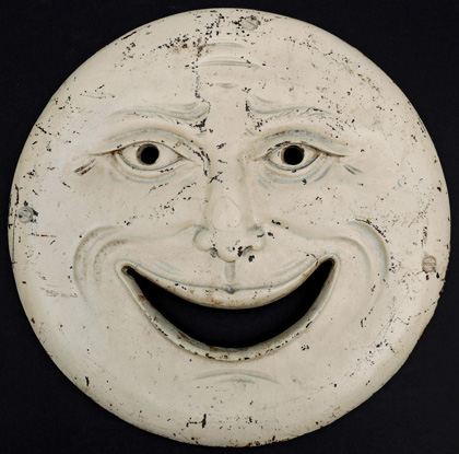 Only known example of H.C. Evans Company’s cast‑iron Man in the Moon shooting gallery target, 15in diameter, wonderful expression and dimensional detailing not typically seen on targets.Sold for $17,700