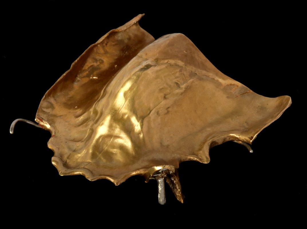A LARGE HEAVY DENTAL GOLD CASTING
