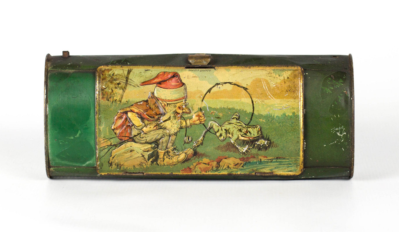 A 19TH C. GERMAN TIN LITHO VASCULUM WITH A GNOME