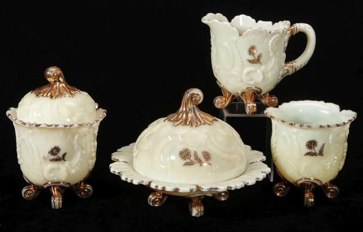 A NORTHWOOD CUSTARD GLASS 'LOUIS XV' TABLE SET