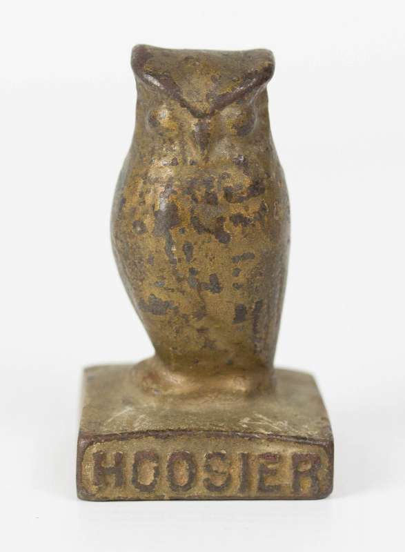 A CAST IRON ADVERTISING HOOSIER OWL PAPERWEIGHT