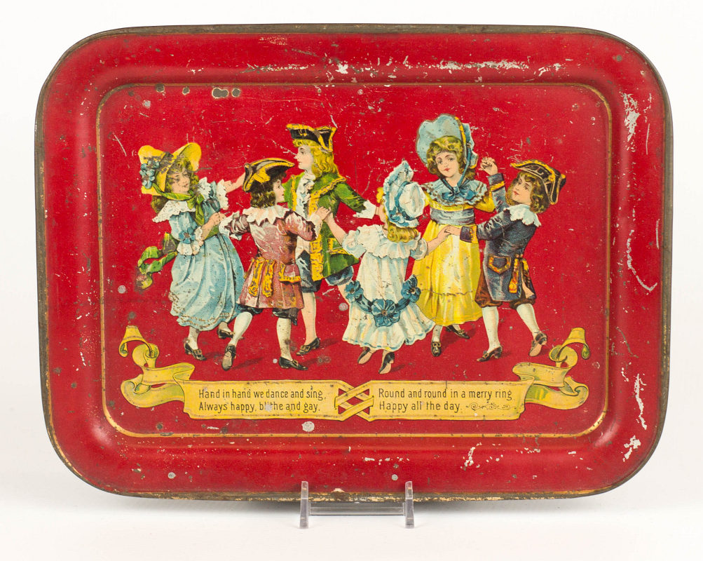 A TIN LITHO CHILD'S TRAY WITH DANCING CHILDREN