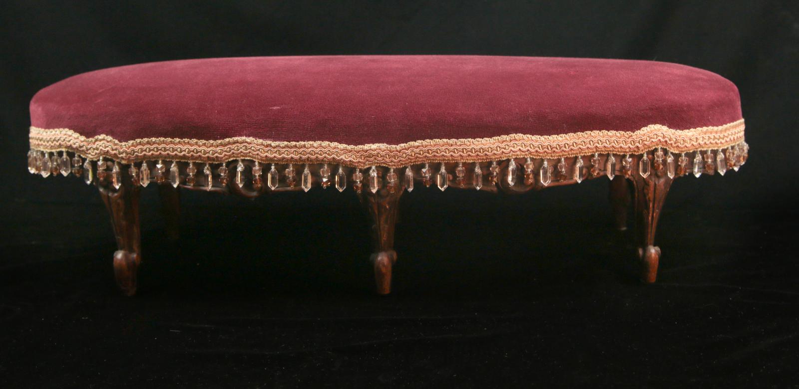 A 19TH CENTURY FRENCH SIX-LEGGED CUSHIONED STOOL 