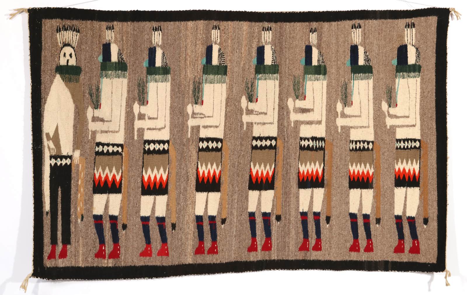 A LARGE NAVAJO YEI-BE-CHAI PICTORIAL WEAVING