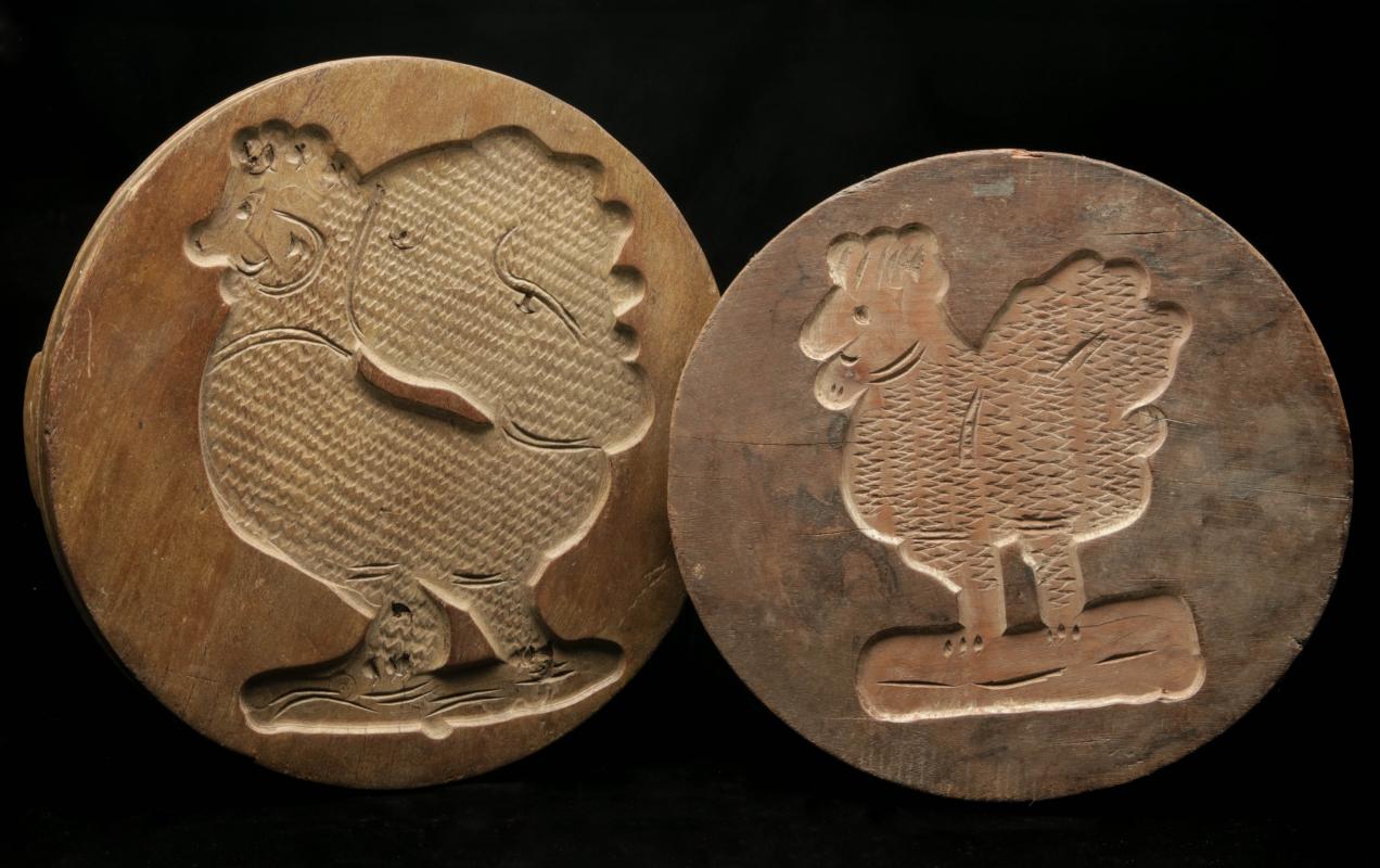 A PAIR 19TH CENTURY CARVED WOOD FOOD PRESS MOLDS