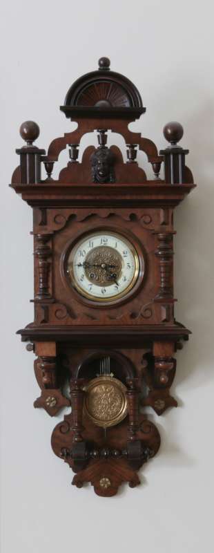 A GUSTAV BECKER OPEN WAG CLOCK WITH LADY'S HEAD