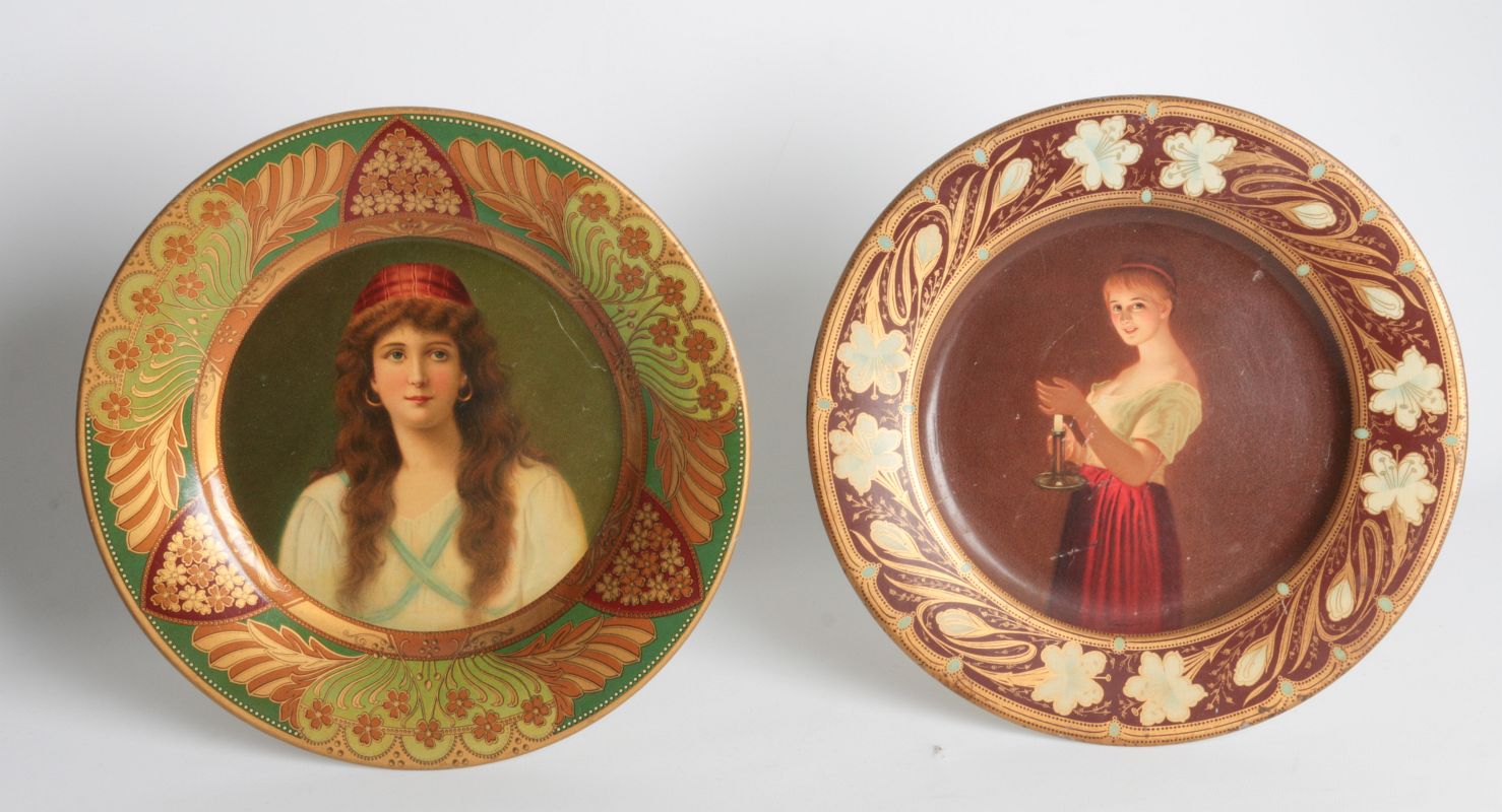 A VIENNA ART PLATE TIN LITHO PLAQUE, PLUS ANOTHER