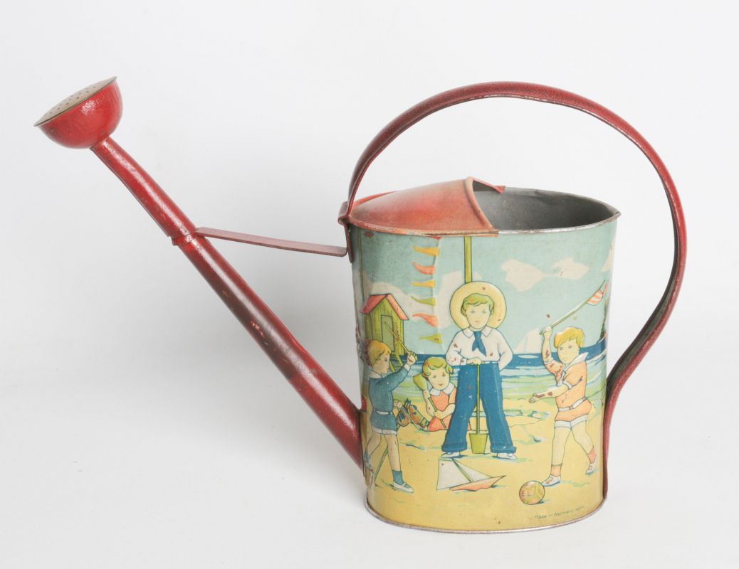 A CHILD'S EMBOSSED TIN LITHO WATERING CAN C. 1920