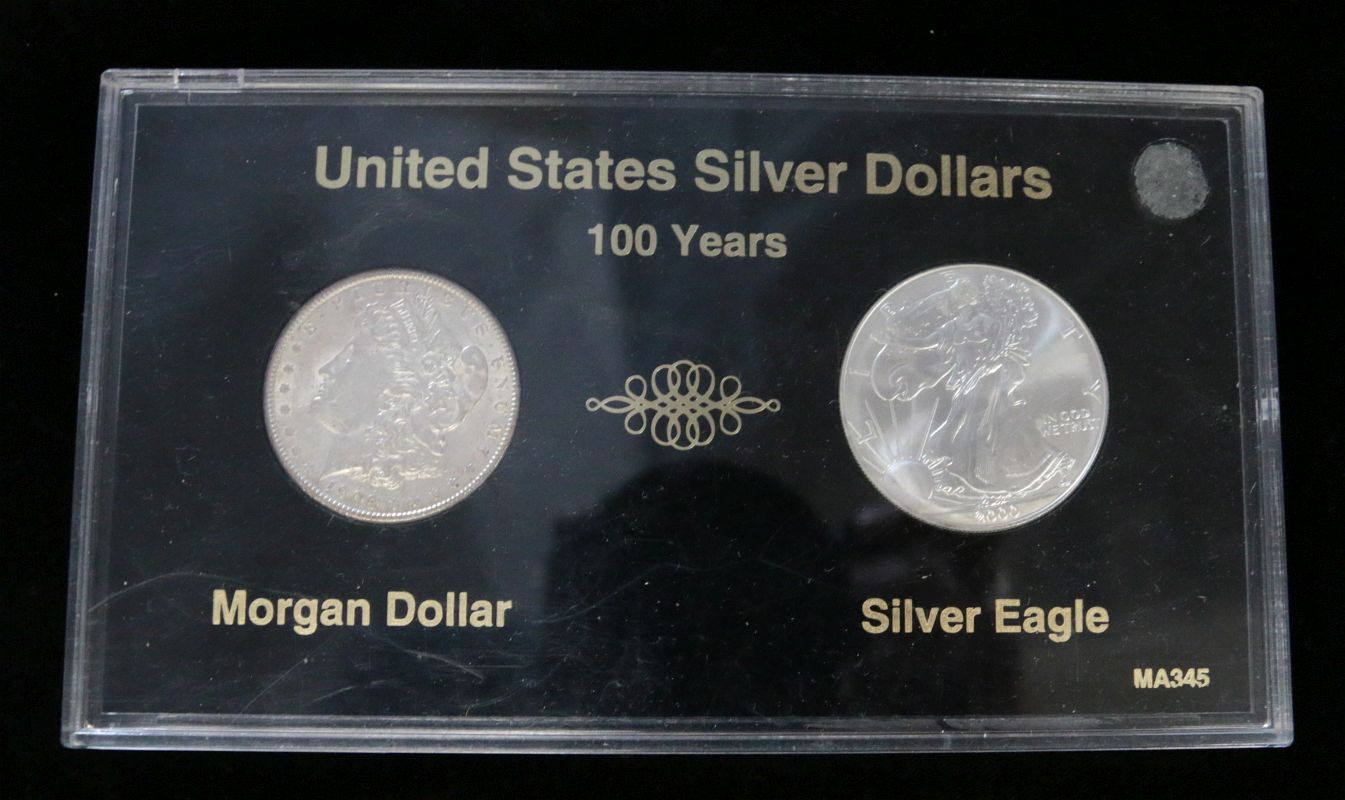 A 1900 MORGAN AND 2000 AMERICAN EAGLE SILVER COINS