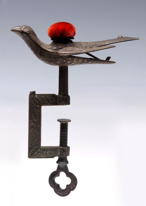 AN ANTIQUE SEWING BIRD CIRCA 1850