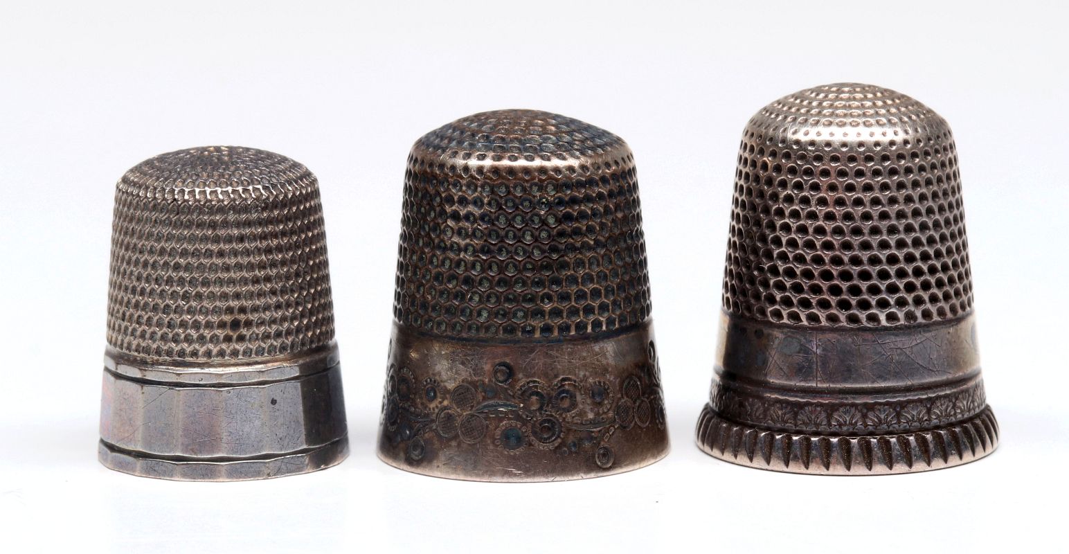 THREE ANTIQUE STERLING SILVER THIMBLES
