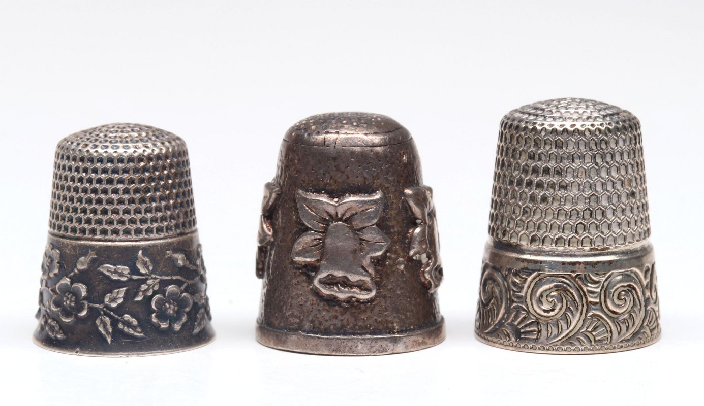 THREE ANTIQUE STERLING SILVER THIMBLES