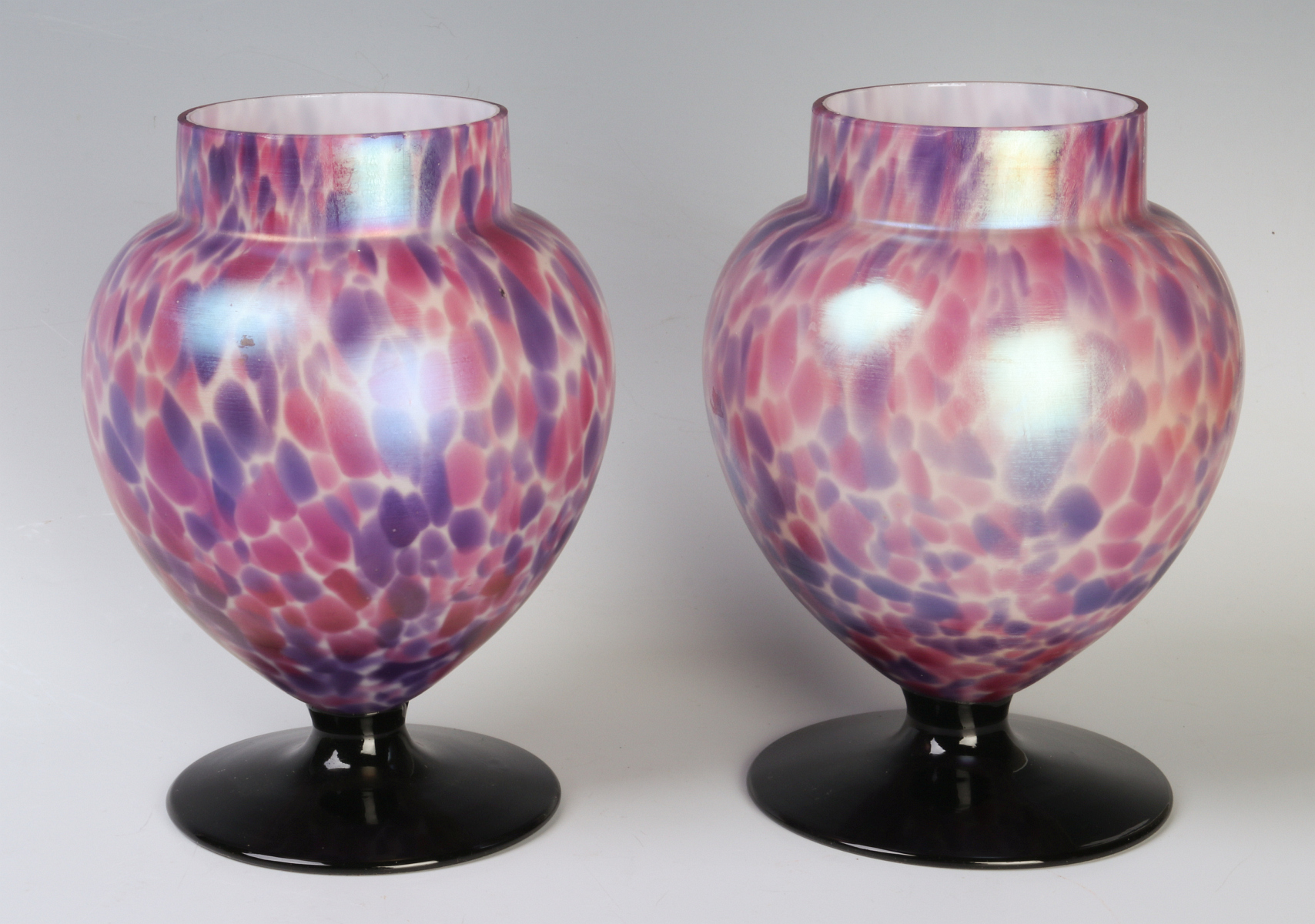 A PAIR OF FOOTED ART GLASS VASES ATTR AS CZECH