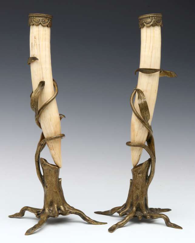 A PAIR OF BRONZE MOUNTED WALRUS TUSK STANDS