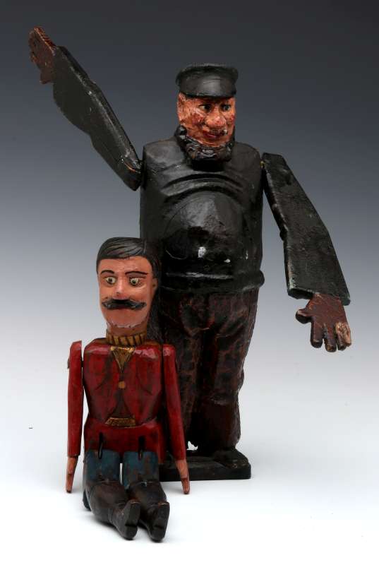 TWO 20TH CENTURY CARVED AND PAINTED WOOD FIGURES