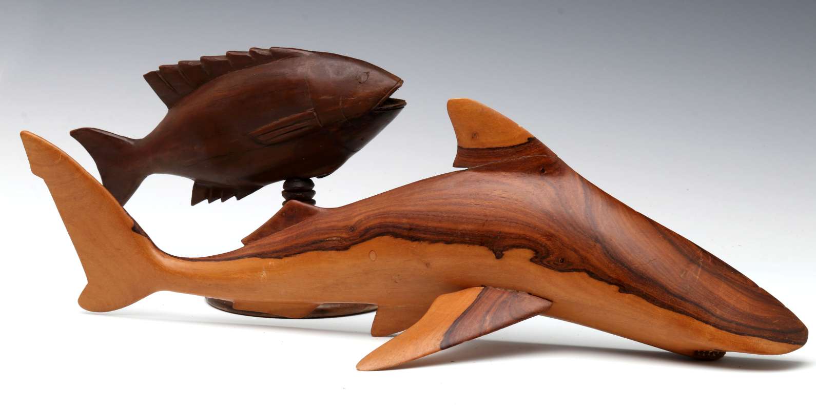 TWO PITCAIRN ISLAND CARVED WOOD FISH MODELS