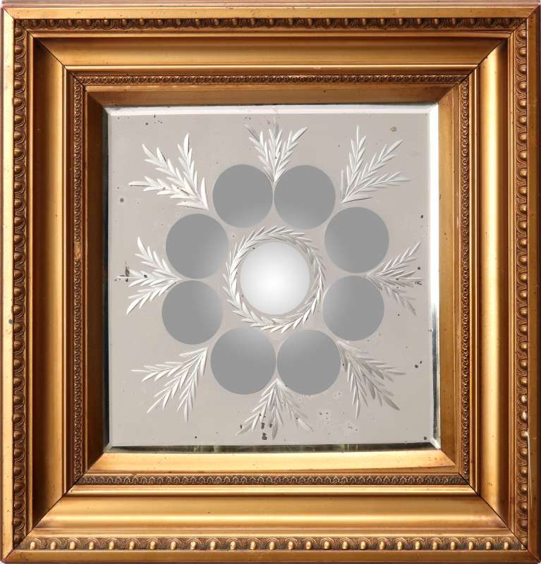 A REVERSE CUT AND ETCHED MIRROR PANEL