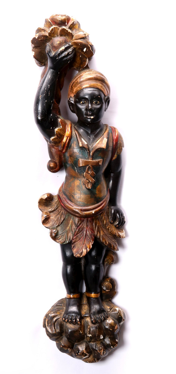 AN EARLY 20TH C. CARVED AND PAINTED BLACKAMOOR