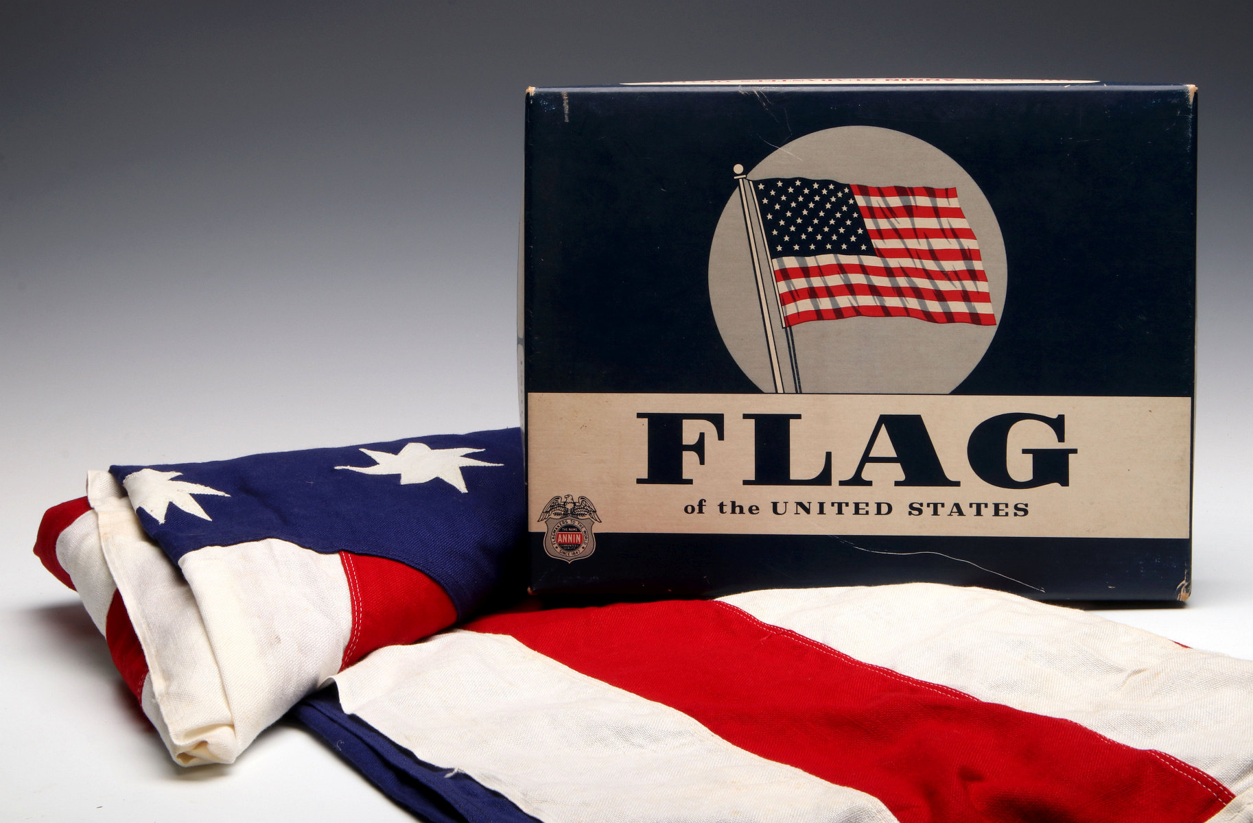 AN AMERICAN BICENTENNIAL FLAG IN BOX