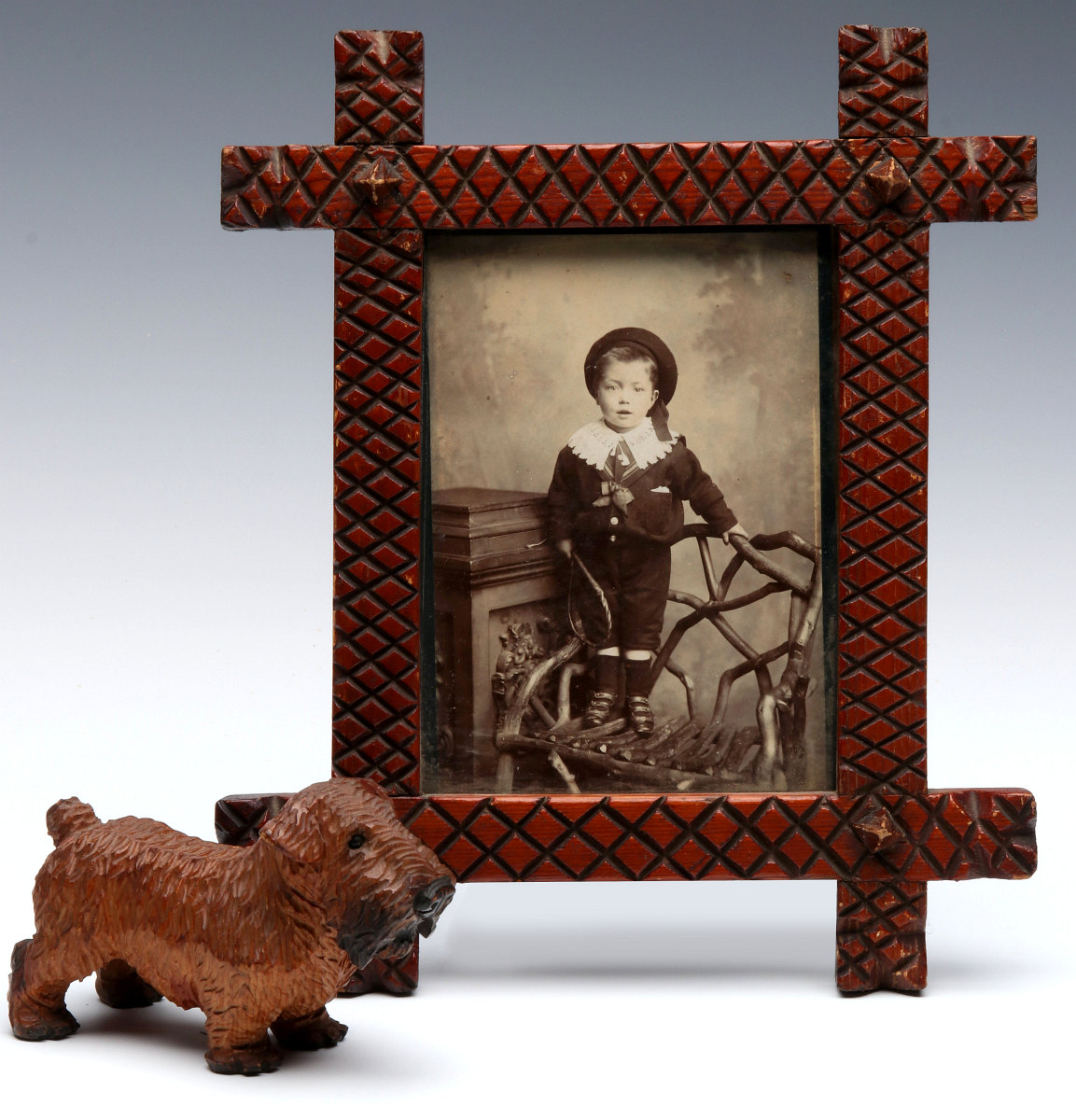 EARLY 20TH C. FOLK ART CARVING AND PICTURE FRAME