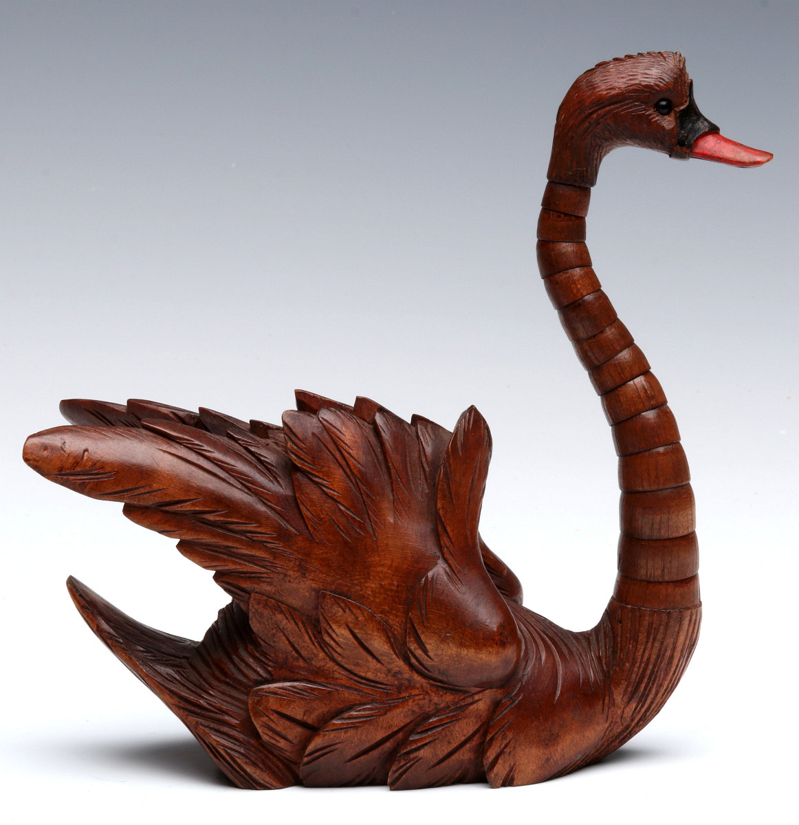 ELABORATE CARVING OF A SWAN WITH ARTICULATED NECK