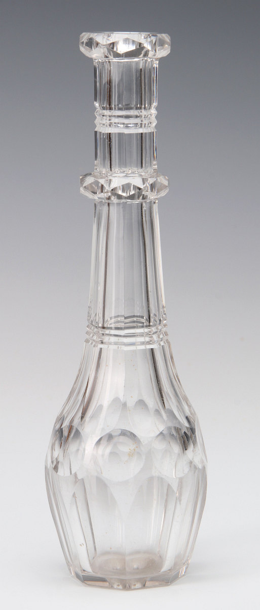 A GEORGIAN CUT GLASS TODDY LIFTER CIRCA 1810