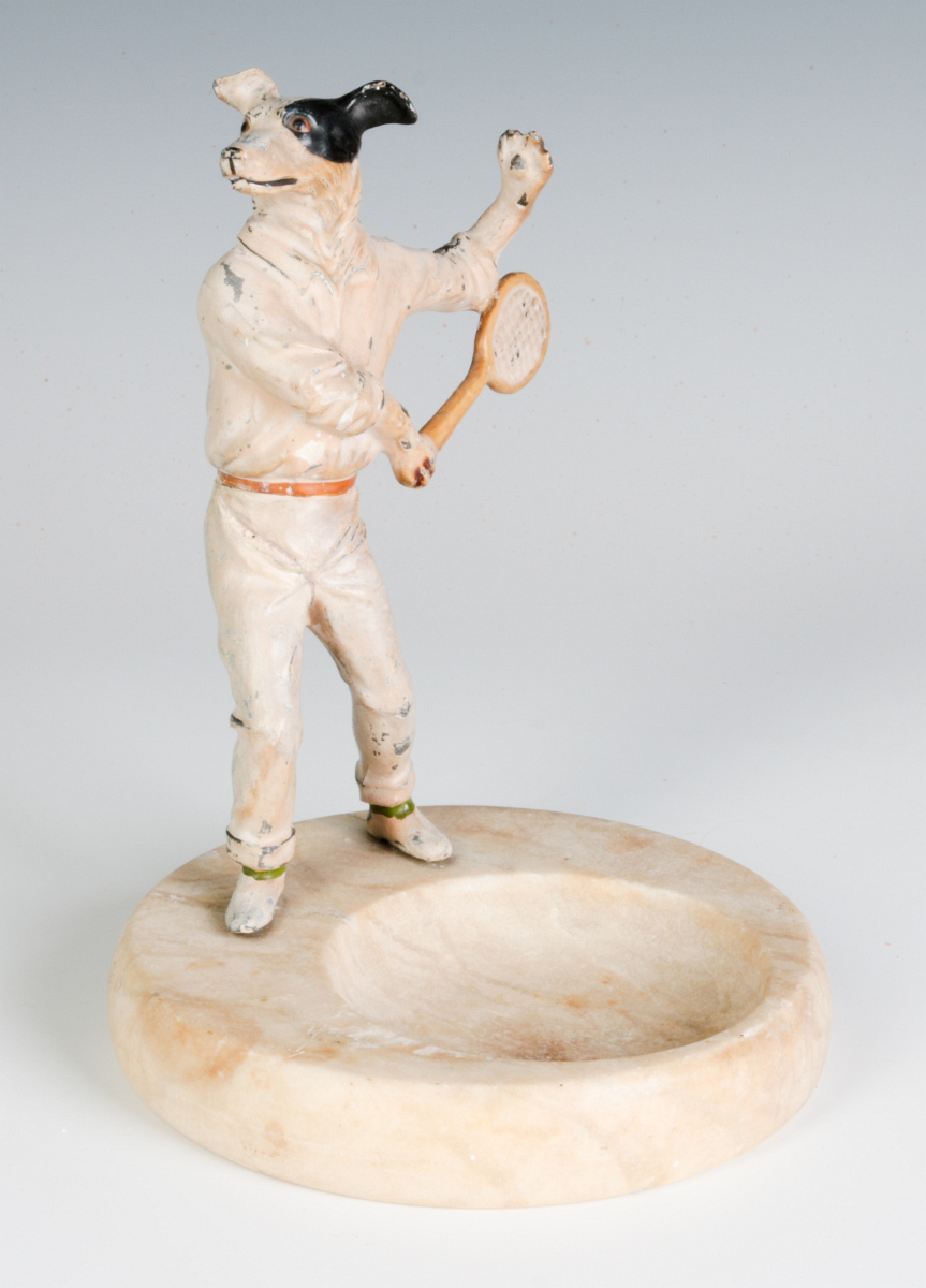 COLD PAINTED FIGURE OF TENNIS PLAYING DOG, C. 1920