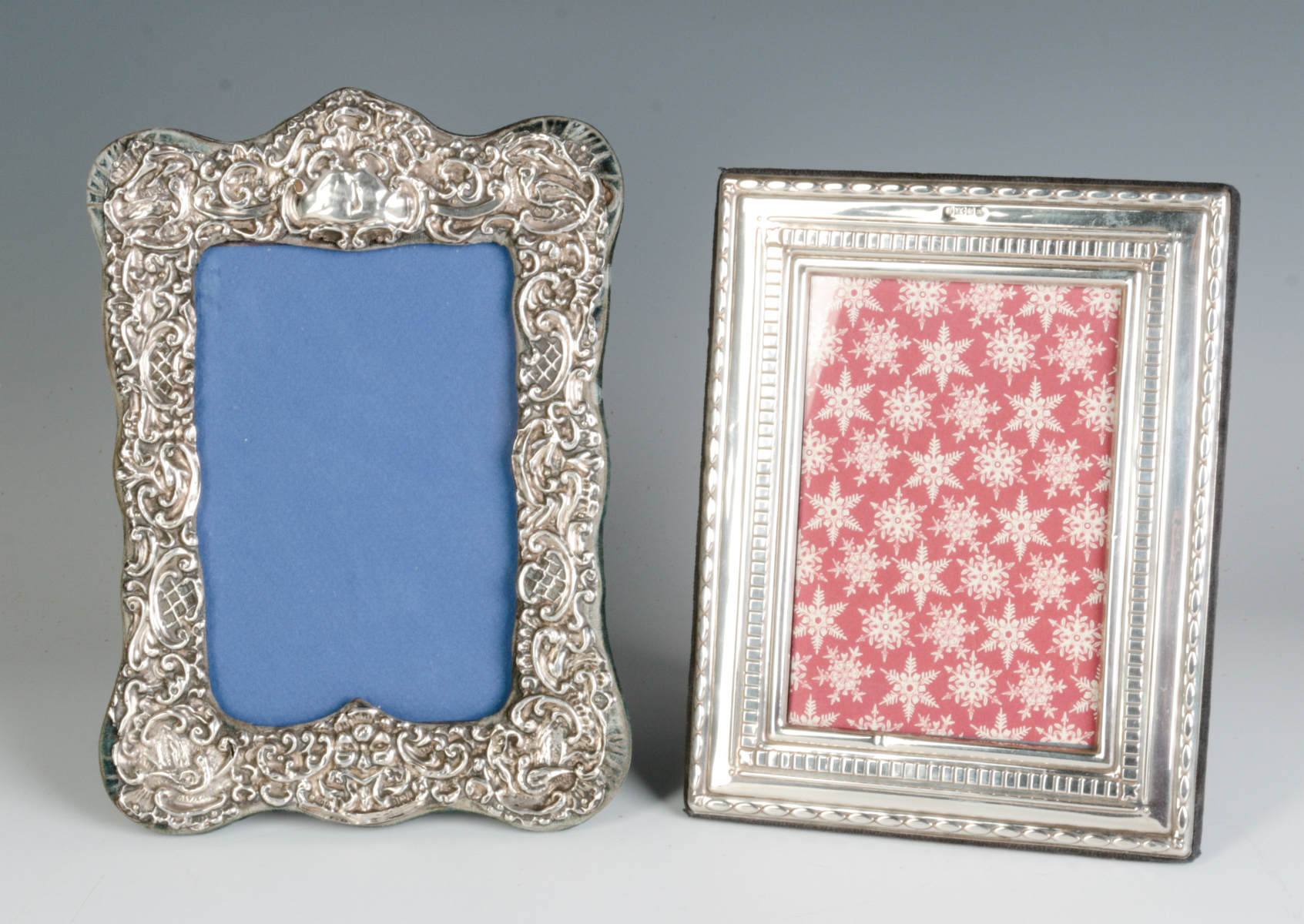 TWO STERLING SILVER EMBELLISHED PICTURE FRAMES