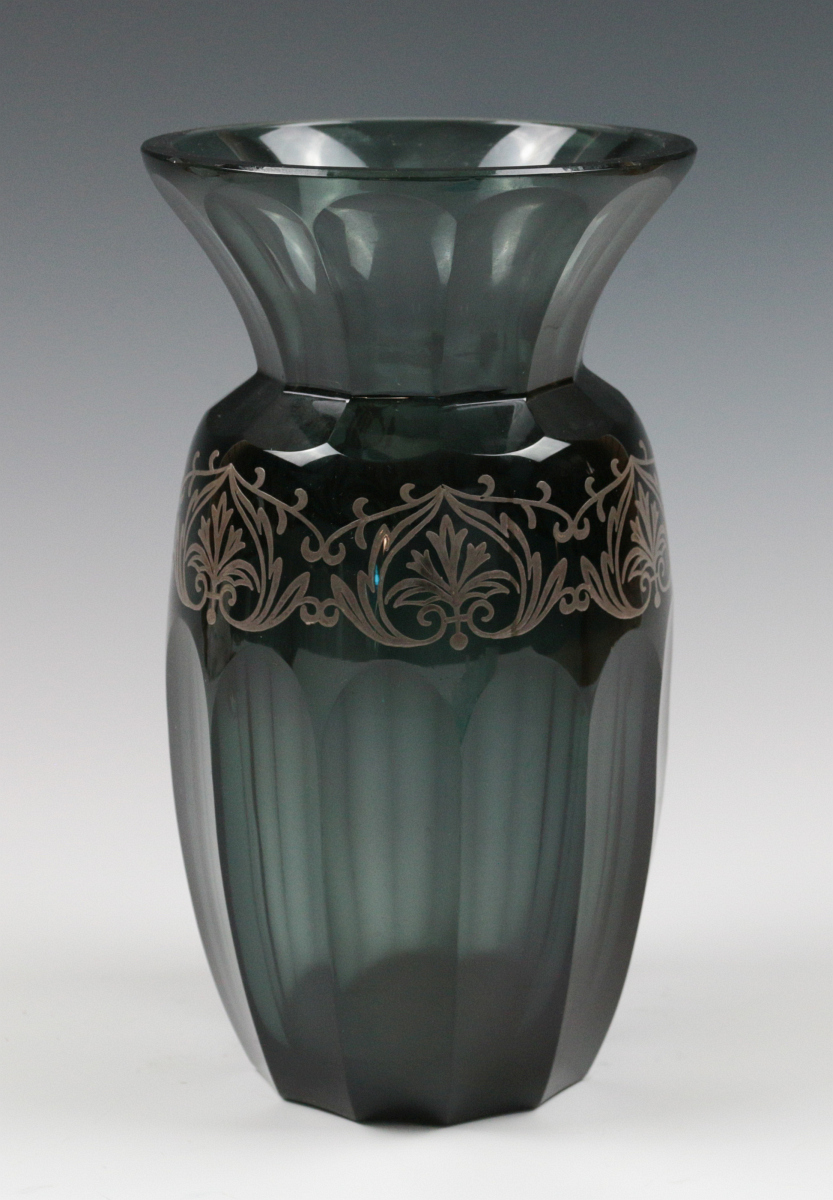 A BOHEMIAN POLISHED GLASS VASE WITH SILVER OVERLAY