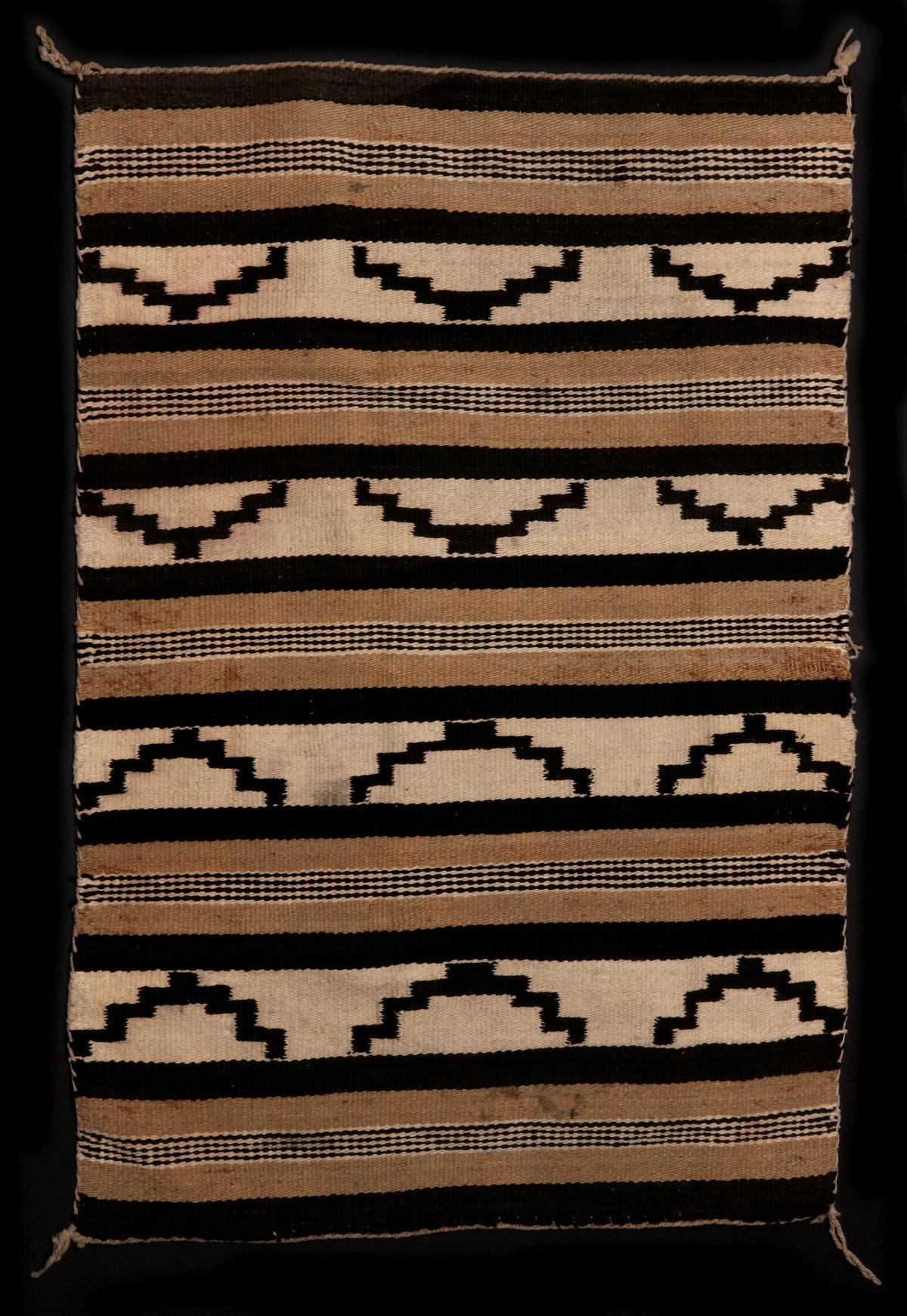 A LATE 20TH C. CHINLE NAVAJO WEAVING