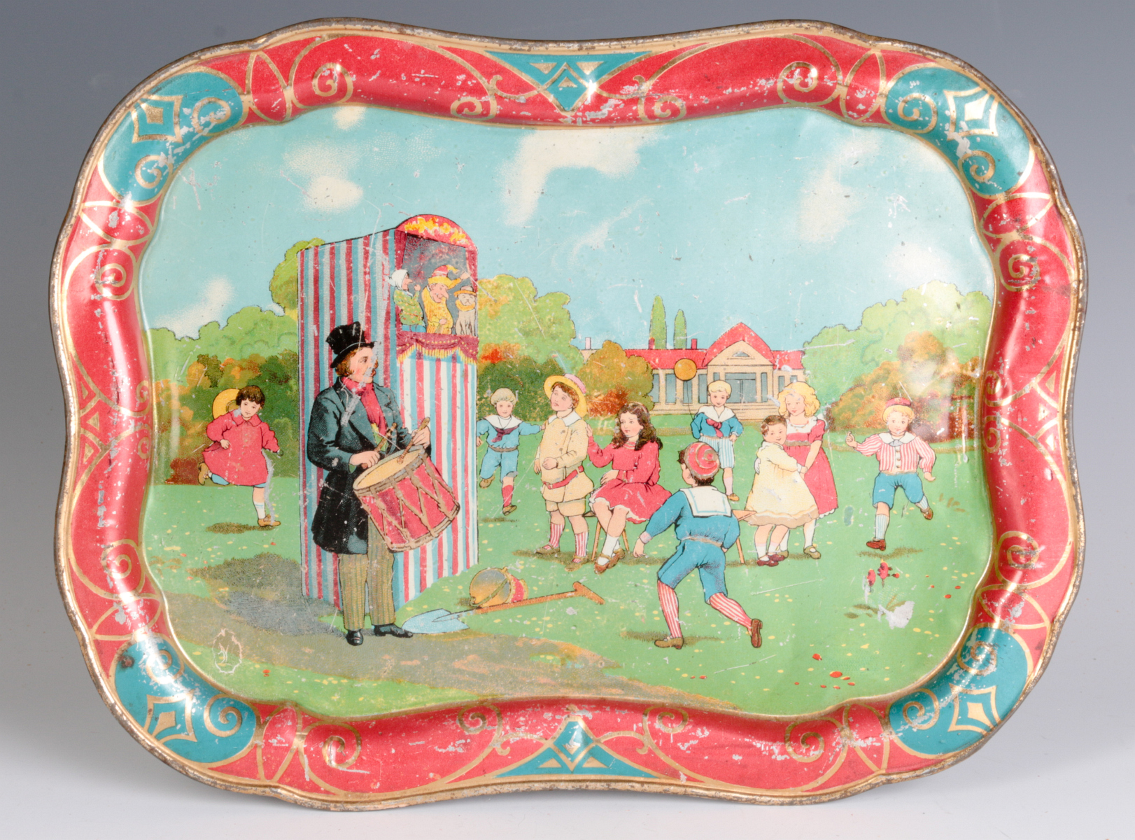 A VICTORIAN TIN LITHO CHILD'S TRAY W/ PUPPET SHOW