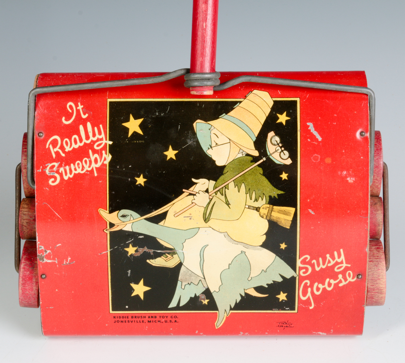 A 'SUZY GOOSE' TIN LITHO CHILD'S CARPET SWEEPER