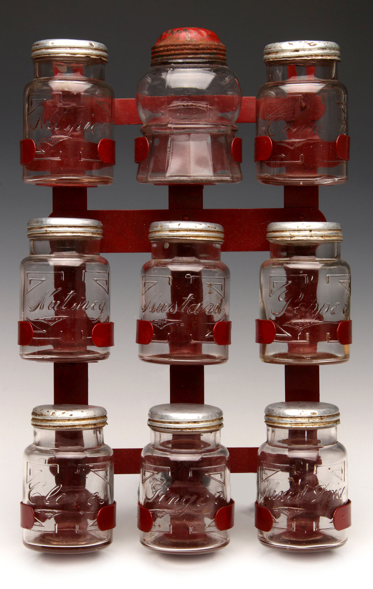 AN UNUSUAL 1930s GLASS JAR HANGING SPICE RACK