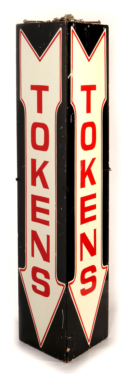 A VINTAGE THREE-SIDED PAINTED 'TOKENS' ARROW SIGN
