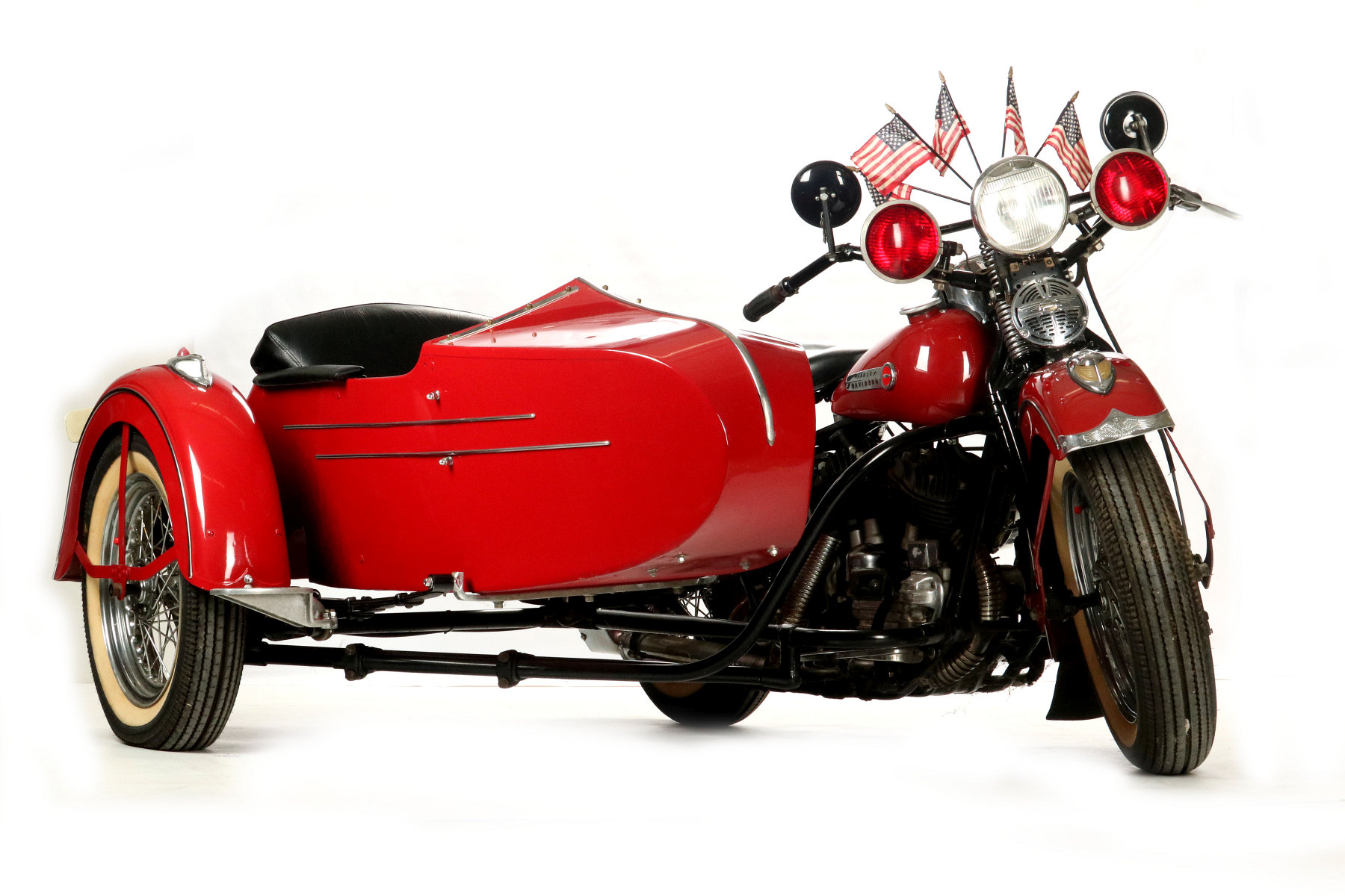 A 1948 HARLEY DAVIDSON MOTORCYCLE WITH SIDECAR
