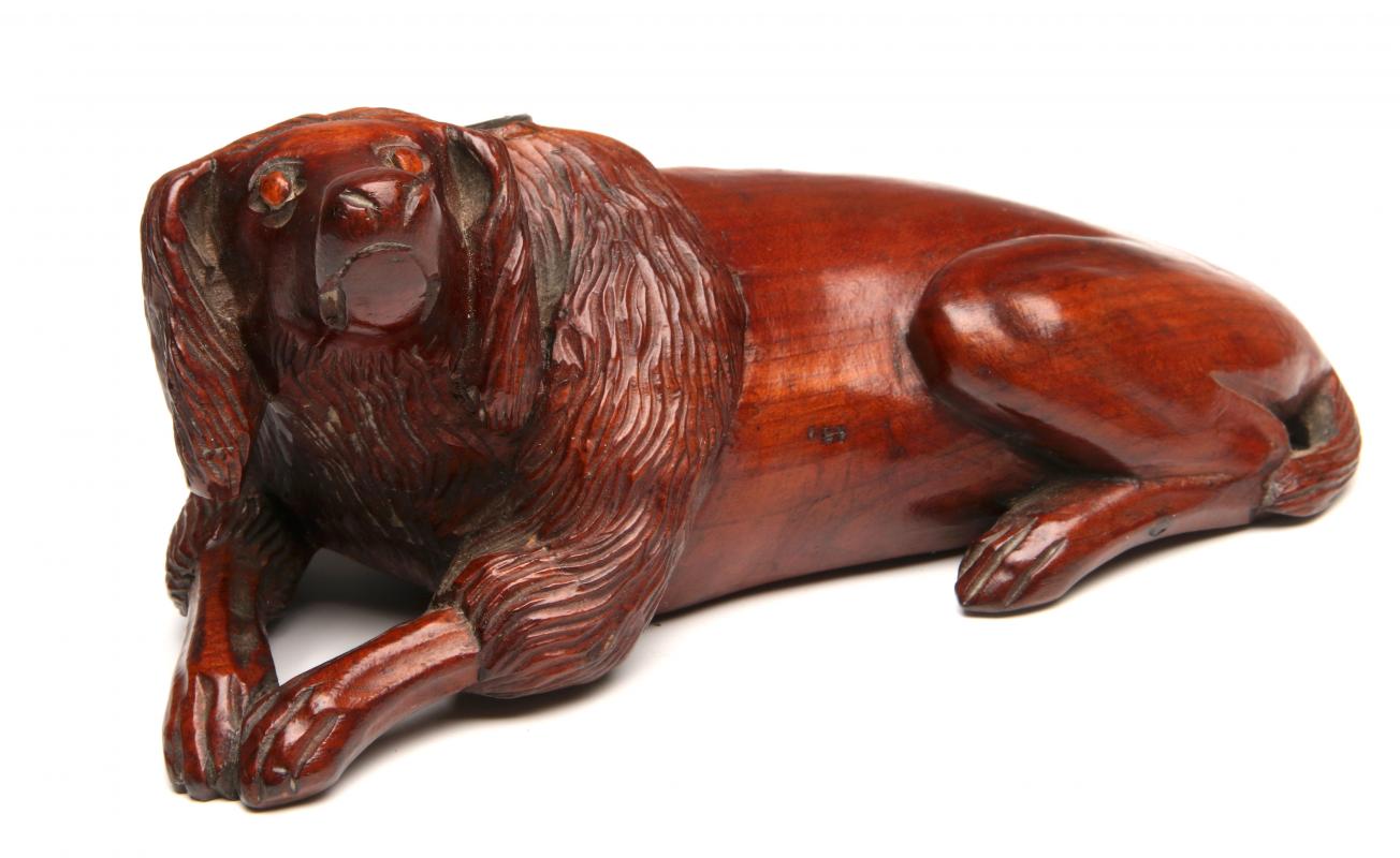 A LATE 19TH CENTURY CARVED WOOD DOG INKWELL