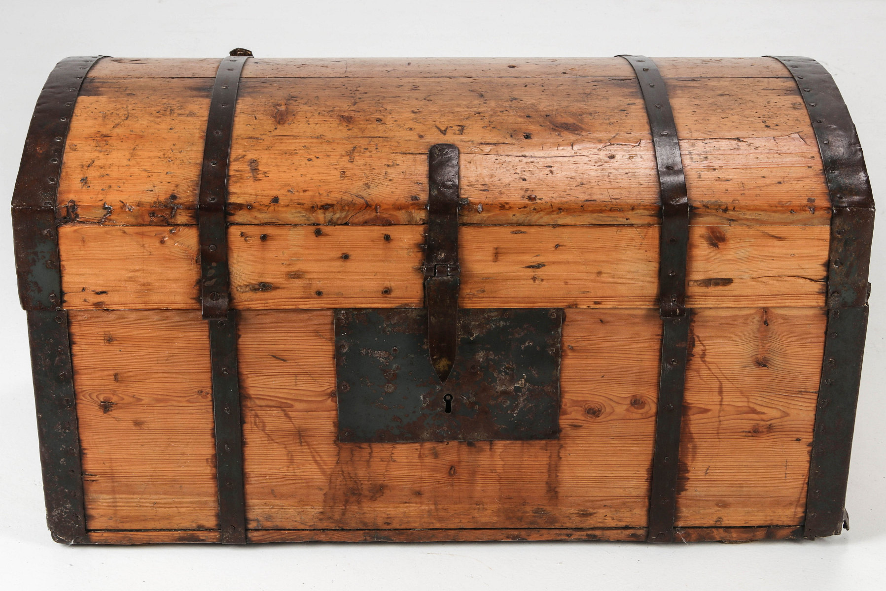 A 19TH CENTURY DOME TOP TRAVEL TRUNK