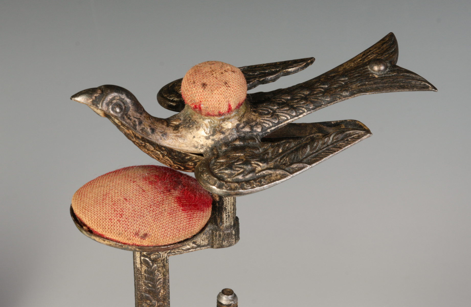 A CIRCA 1860 IRON SEWING BIRD