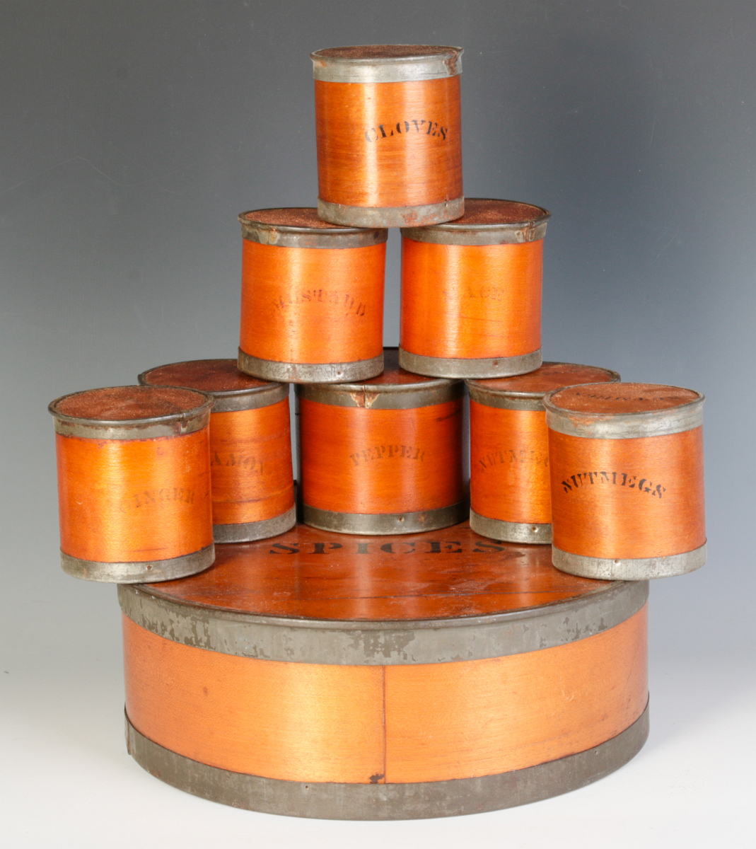 A NINE PIECE BENTWOOD SPICE SET WITH STENCILING
