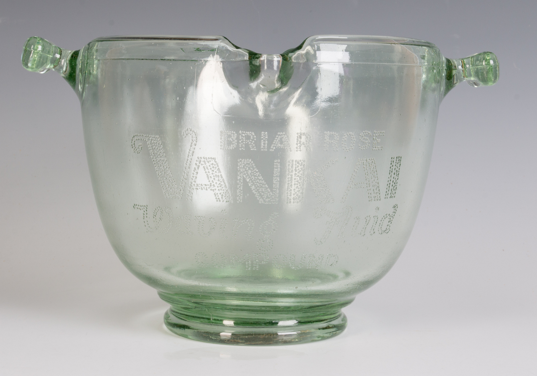 A 1930s GLASS ADVERTISING BOWL, HAIR WAVE COMPOUND