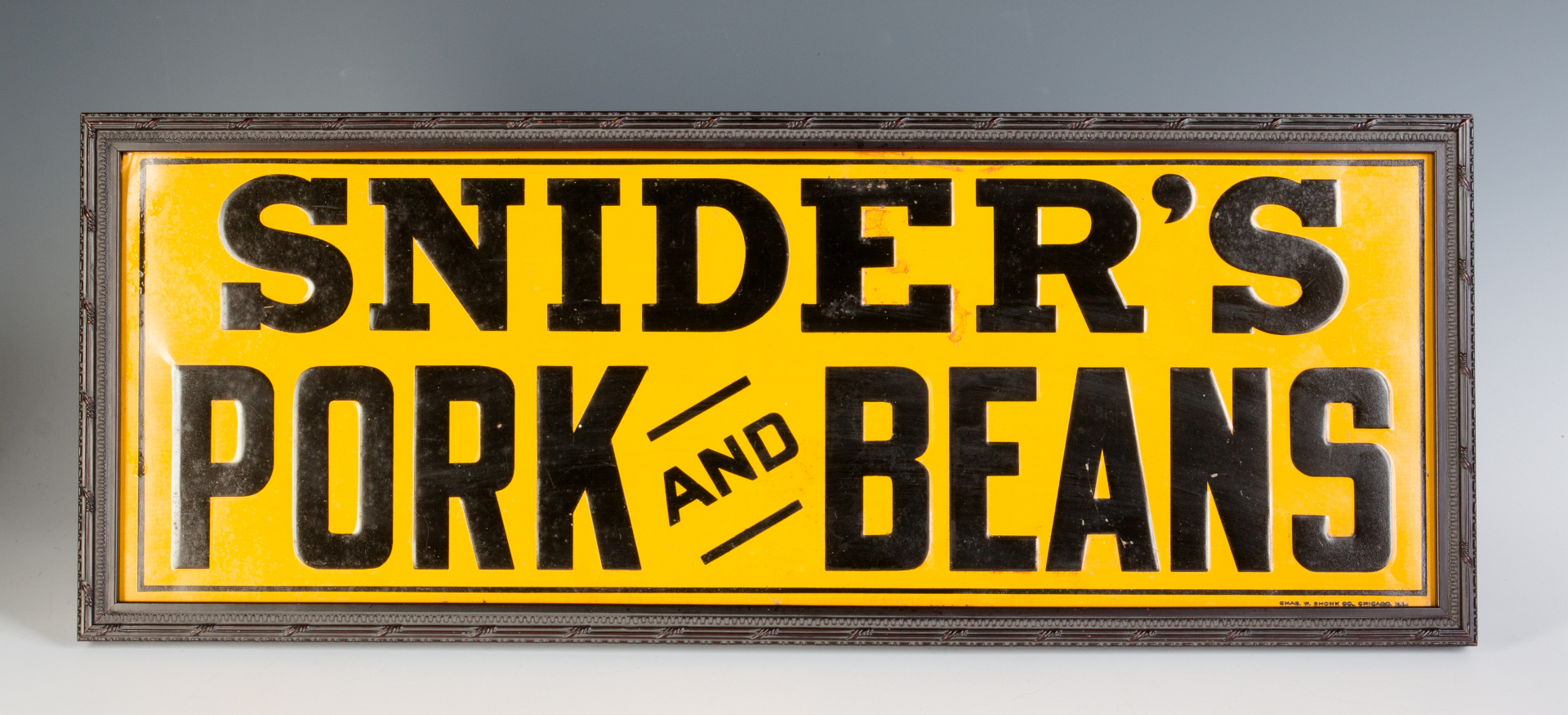 A NICE EMBOSSED TIN SIGN,SNIDER'S PORK AND BEANS