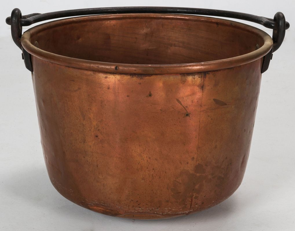 A LARGE 19 C COPPER KETTLE WITH FORGED IRON HANDLE