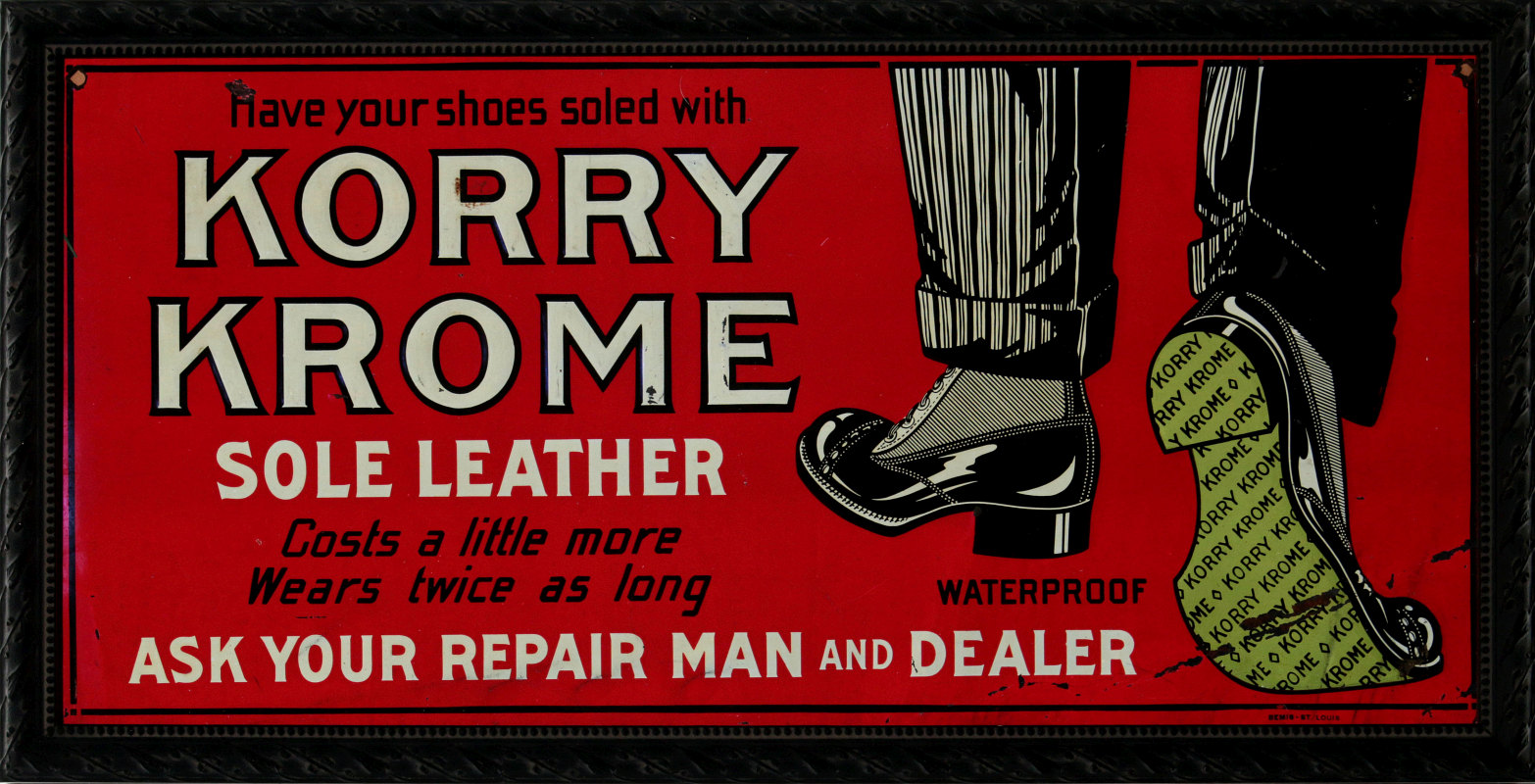 A CIRCA 1930 KORRY KROME SOLE LEATHER TIN SIGN