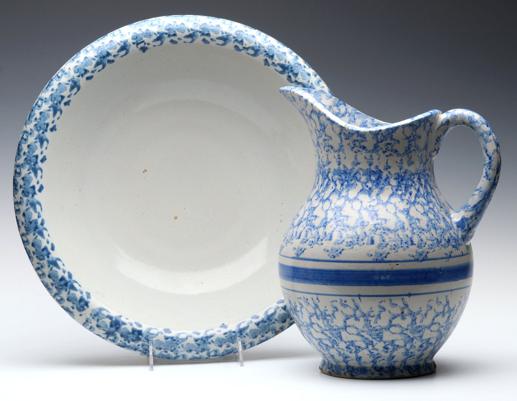 A BLUE AND WHITE SPONGEWARE BOWL AND PITCHER SET