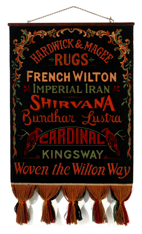 A WOVEN ADVERTISING SAMPLER HARDWICK & MAGEE RUGS