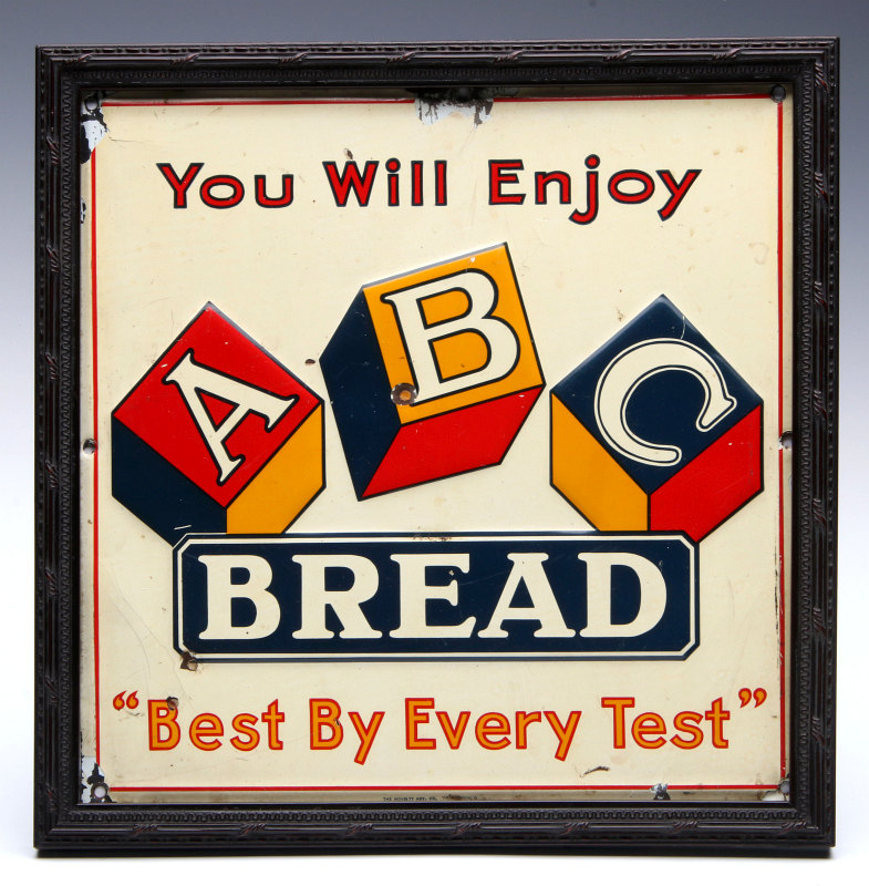 AN EMBOSSED TIN SIGN FOR ABC BREAD CIRCA 1930s