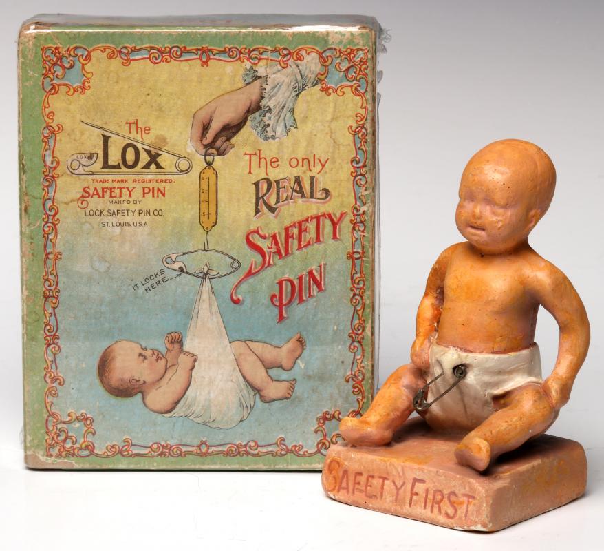 A 1900s BOX WITH GREAT GRAPHICS FOR LOX BABY PINS