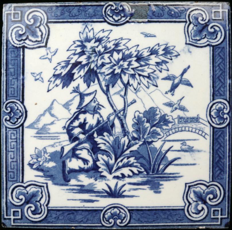 A MINTON HOLLIS BLUE AND WHITE VICTORIAN ART TILE