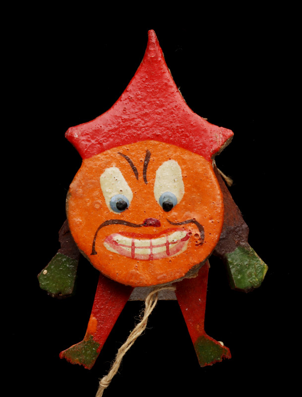 A SMALL ARTICULATED PAINTED WOOD HALLOWEEN TOY