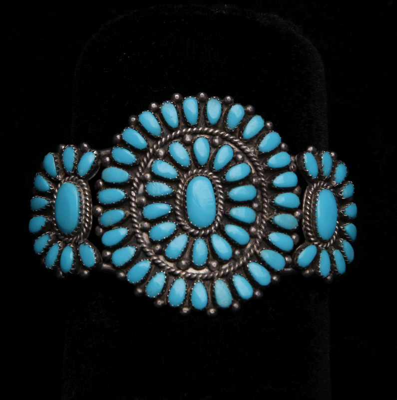 A ZUNI STERLING SILVER AND TURQUOISE CUFF BRACELET
